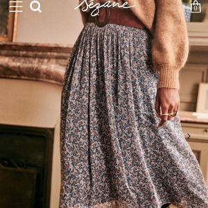 Sezane midi length floral skirt.